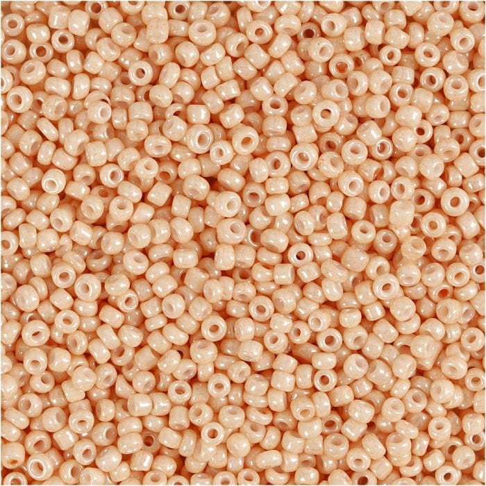 Rocaiperler, diam. 1,7 mm, str. 15/0, hulstr. 0,5-0,8 mm, lys fersken, 25 g/ 1 pk.