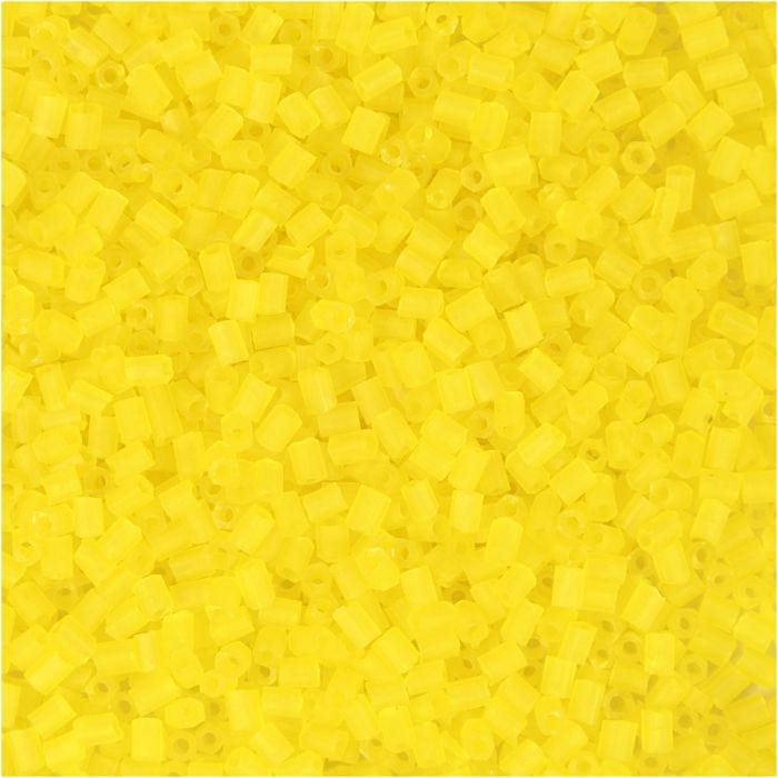 Rocaiperler 2-cut, diam. 1,7 mm, str. 15/0, hulstr. 0,5 mm, transparent gul, 25 g/ 1 pk.