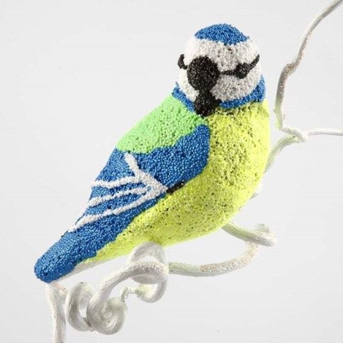 Fugl i papmaché, beklædt med Foam Clay
