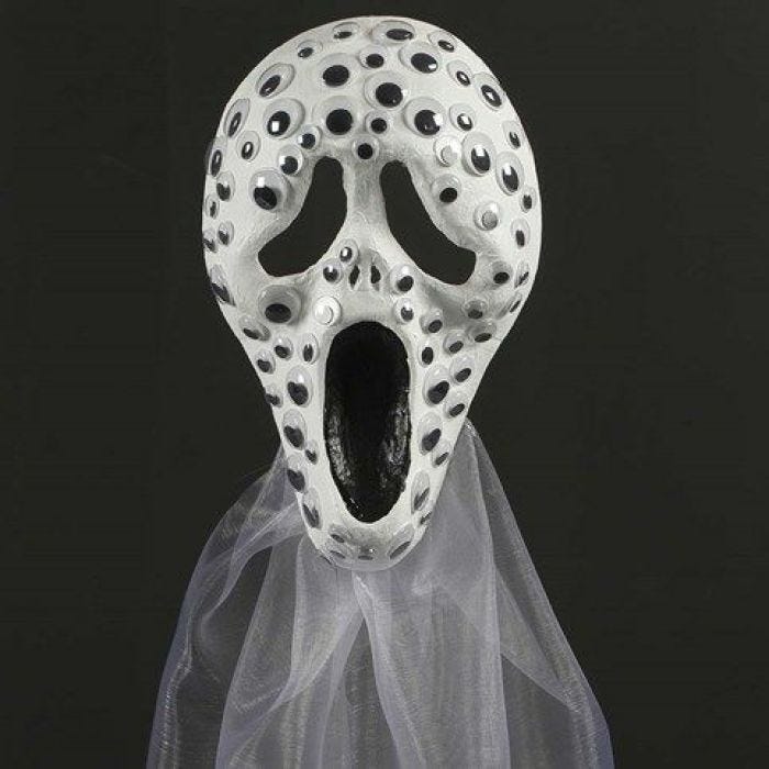 Scream maske af papmaché pyntet med rulleøjne og organzastof