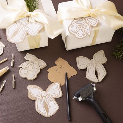 Til- og frakort med linoleumstryk