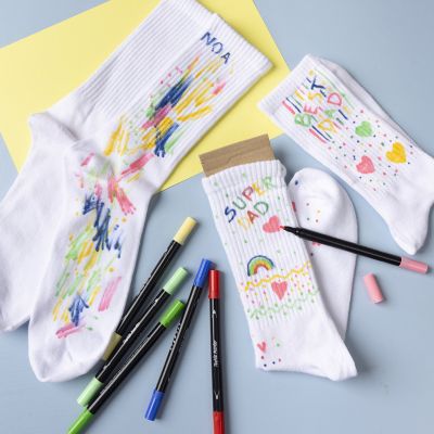 Personlige strømper dekoreret med tekstiltusch