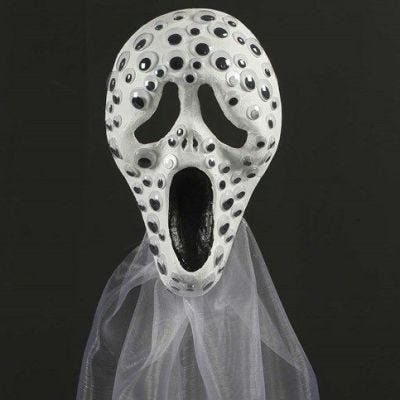 Scream maske af papmaché pyntet med rulleøjne og organzastof