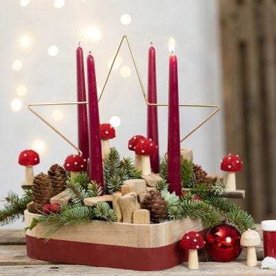 Adventsdekoration med metalstjerne