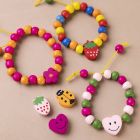 Elastik armbånd med træperler i klare farver