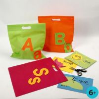 Mulepose med bogstaver af filt